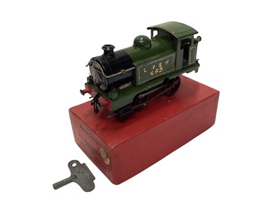 Lot 1933 - Hornby O Gauge clockwork LNER green M1 locomotive with key & box, plus three other clockwork locomotives (4)