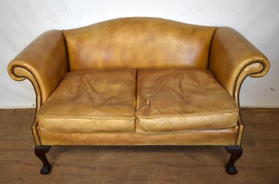 Lot 1428 - Two seater stud closed leather sofa