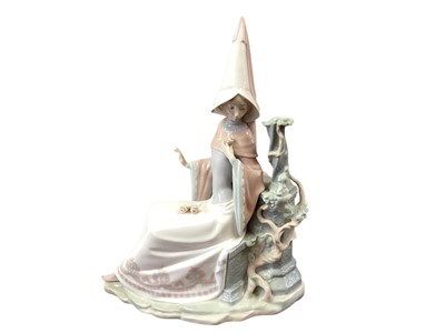 Lot 1217 - Large Lladro figure and three Doulton figurines