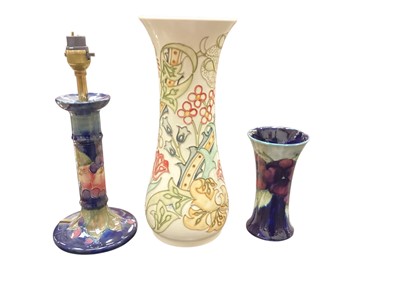 Lot 1213 - Modern Moorcroft pottery vase, together with a Moorcroft pottery vase (cracked) and a Moorcroft lamp (converted from a candlestick).