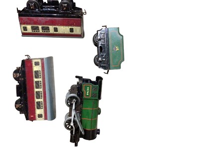 Lot 1967 - Hornby O Gauge clockwork BR green 0-4-0 locomotive and tender with two coaches, turntable, level crossing and track