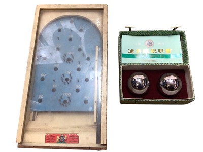 Lot 1970 - Chad Valley vintage pin ball game, Texas Instruments Speak & Spell, Puck Monster digital game and Chinese Health Balls