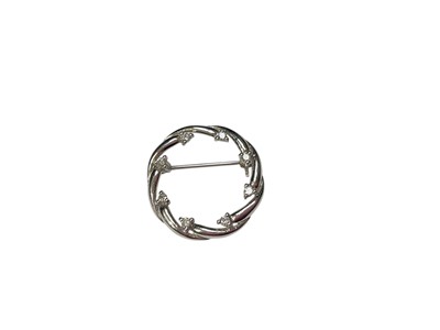 Lot 183 - 9ct white gold diamond set wreath brooch