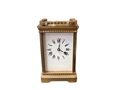 Lot 2437 - Brass cased striking carriage clock, in original case