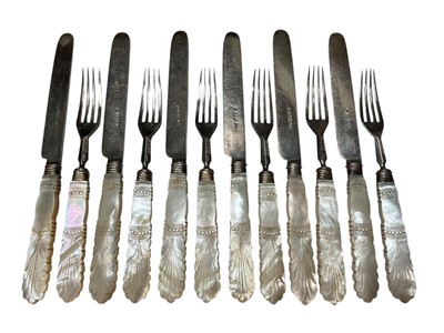 Lot 197 - Set of six Georgian silver fruit knives and forks with carved mother of pearl handles