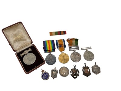 Lot 709 - Boer War King's South African medal with two clasps South Africa 1901 and South Africa 1902 named to 34702 DVR. W. Doughty R.F.A. Together with a First World War pair comprising War and Victory...