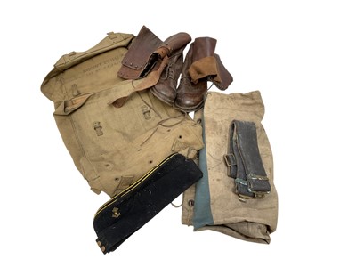 Lot 713 - Pair of Second World War era brown leather military boots, together with canvas webbing bag, stable belt and other Militaria (1 box).