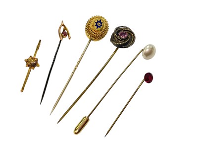 Lot 154 - Group of gilt metal stick pins, 9ct gold horseshoe stick pin and a gold bar brooch