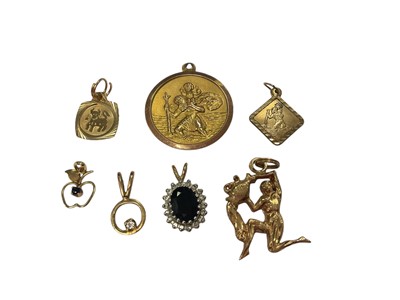 Lot 160 - 9ct gold St Christopher pendant, together with six other 9ct gold pendants/charms
