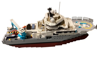 Lot 2038 - Constructed Lego ship, orange super car, Concorde & dustcart models (not complete) (4)