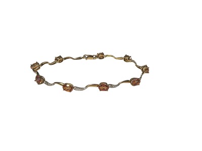 Lot 185 - 9ct gold gem set and diamond articulated link bracelet, 18.5cm long