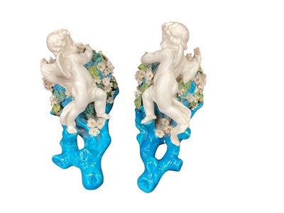 Lot 1220 - Pair of Victorian majolica ceramic putti wall-pockets