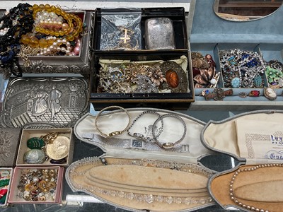 Lot 233 - Early 20th century silver cigarette case together with costume jewellery including brooches, necklaces and faux pearl items.