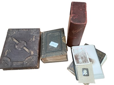 Lot 1509 - 2x leather carte de visite albums with contents and a leather faux book photograph storage book with cabinet cards