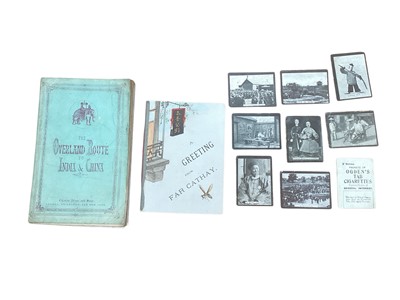 Lot 1514 - Of China Interest - 2x travel booklets "A greeting from Cathay" Shanghai, Kelly & Walsh and "The Overland Route to India & China" complete with coloured engravings of Hong Kong & Sin...
