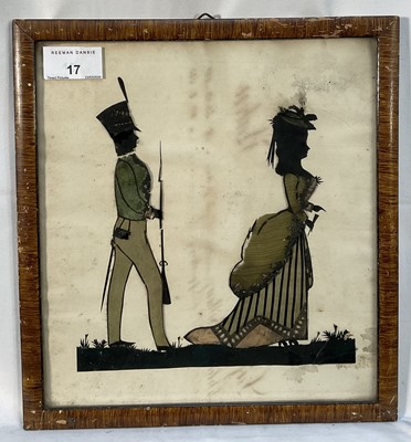 Lot 17 - Early 19th century silhouette collage, paper cut and fabric coloured of a military officer and a lady, 25cm x 23cm