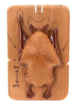 Lot 883 - Carved bat by Chris Pye