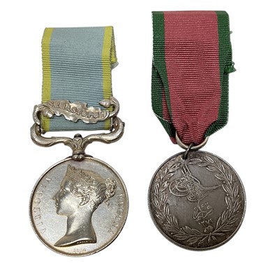 Lot 28 - Victorian Crimea medal pair comprising Crimea medal with Sebastopol clasp named to PTE. J. B. Coles. 12th Lans. and Turkish Crimea medal, unnamed as issued. Together with some printed research.