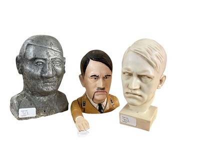 Lot 752 - Painted cast metal money box in the form of Adolf Hitler, together with a metal bust and resin bust of Hitler (3)