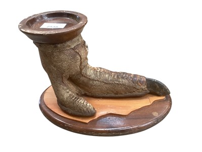 Lot 2538 - Taxidermy- a preserved Ostrich foot, possibly an ashtray, mounted on wooden base, 27cm in overall length.