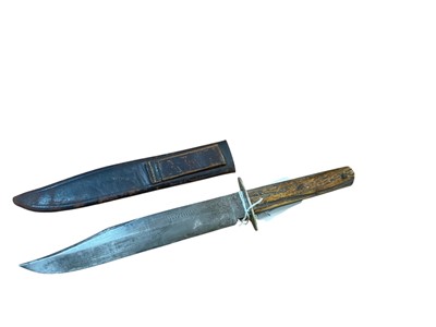Lot 870 - Edwardian Sheffield made Bowie Knife with 21cm blade, clip back point and false edge, signed Fortnum & Mason. Ltd Jermyn Street, and staghorn handle, in original leather sheath with stamped...