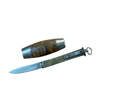 Lot 879 - Late 19th century Swedish Barrel knife, with curly birch wood grip and steel end caps, removable hinged blade unsigned, brass case stamped SEGERSTROM ESKILSTUNA SWEDEN on one side, fitted with a...