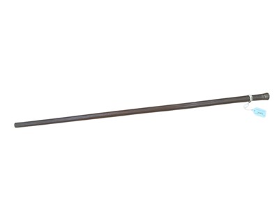 Lot 2565 - Late 19th/early 20th century “Tipplers” walking stick with wooden shaft, possibly Malacca, and a silver plate on copper top, unscrewing to reveal a compartment containing a spirit flask and smal...