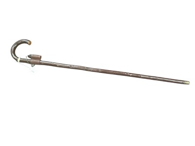 Lot 2566 - Unusual late 19th century gentlemen’s walking stick with Cherrywood shaft and crook handle, the shaft with a leather bucket containing a carved horn whistle with silver chain and gilt white meta...