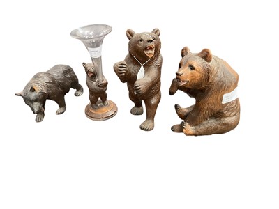 Lot 2485 - Four early 20th century German Black Forest carved wooden bear ornaments including standing bears and spill vase , tallest 20cm (4)
