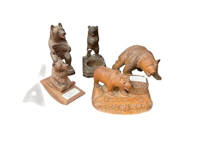 Lot 2492 - Five early to mid-20th century German Black Forest carved wooden bear ornaments including smokers companion and blotter , tallest 20cm (5)