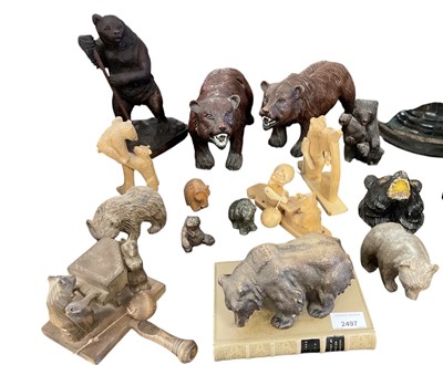 Lot 2497 - Collection modern Black Forest-style bear ornaments, some wooden and some resign (15)