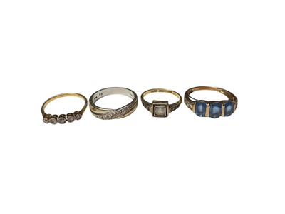 Lot 208 - Four gold rings to include an Edwardian 18ct gold five-stone diamond ring, 18ct white and yellow gold diamond wedding ring, 1920s 18ct gold and platinum ring with white stones, and a 9ct gold ge...