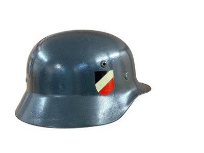 Lot 797 - Second World War Nazi German Luftwaffe M35 pattern helmet with later painted cover and double decals, with original tan leather lining.
