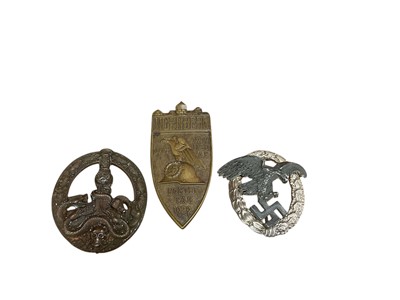 Lot 768 - Nazi Luftwaffe Observer badge with narrow pin backing, together with a Nazi Anti - Partisan War badge and a Nuremberg Commemorative shield badge by F. Hoffstatter Bonn (3).