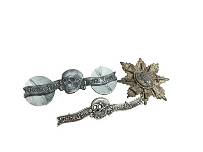 Lot 769 - Two Nazi German uniform badges together with a Hamburg Veterans Honour Cross (3).