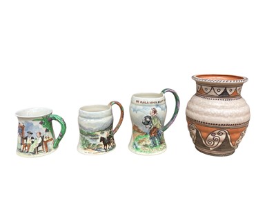 Lot 1257 - Three Crown Devon Fieldings musical tankards, together with a signed Charlotte Rhead Crown Ducal vase (4)