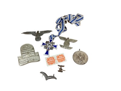 Lot 781 - Group of seven assorted Nazi German badges and decorations to include a Mothers Cross and Second World War clasp to Iron Cross First Class and various others (7).
