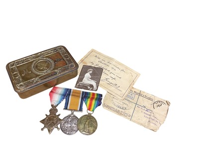 Lot 784 - First World War 1914 - 15 Star trio comprising 1914 - 15 Star, War and Victory medals named to 370. PTE. S. J. Fillmore E. Surr. R, together with a Princess Mary Gift tin and original photograph...