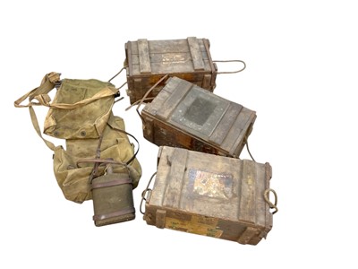Lot 796 - Second World War British military water bottle with cloth covering and leather strap dated 1940, together with three wooden ammunition boxed and two canvas webbing bags (1 box).