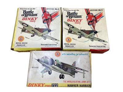 Lot 2047 - Dinky Toys diecast Battle of Britain Spitfire MkII, No.719 (x2) & Hawker Harrier No.722, all boxed (3)