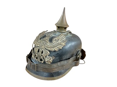 Lot 799 - First World War Imperial German Prussian Other Ranks Pickelhaube helmet, with Prussian eagle plate to front and spike with circular base, brown leather head band and original...