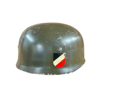 Lot 801 - Second World War Nazi Luftwaffe Fallschirmjager (Paratroopers) Steel Combat Helmet, with double decals including Luftwaffe decal, with later brown leather lining and straps.
