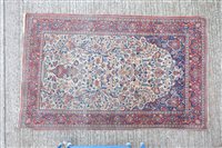Lot 1766 - Good part silk Kashan rug - cream field with...