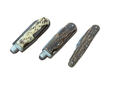Lot 2678 - Two old multi- tool pocket knives with staghorn grips and similar pocket knife (3)