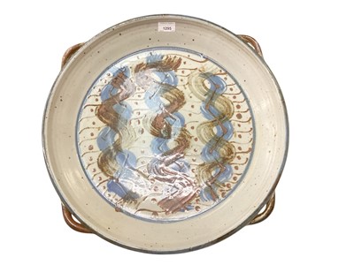 Lot 1295 - Group of studio and art pottery, including a large dish with four handles, green glazed bowl, etc
