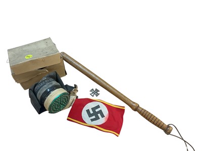 Lot 812 - Old oak turned wood truncheon with ribbed grip, Second World War gas mask and replica German Militaria.