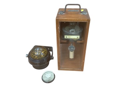Lot 2579 - Simpson Lawrence hand bearing compass in glazed case together with two other compasses.
