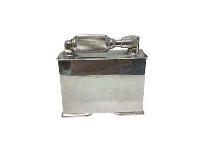 Lot 2581 - Vintage McMurdo chromium plated table lighter, stamped Pat. No. 590958, Made in England to base, 7.5cm in length.