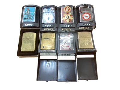 Lot 2590 - Group of eight Zippo advertising lighters including Old Holborn, Moon Landing 30th Anniversary and others original boxes (8).