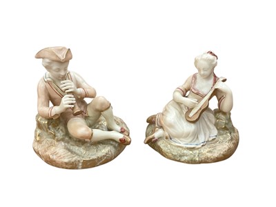 Lot 1282 - Two Royal Worcester blush ivory figures of musicians, no. 547